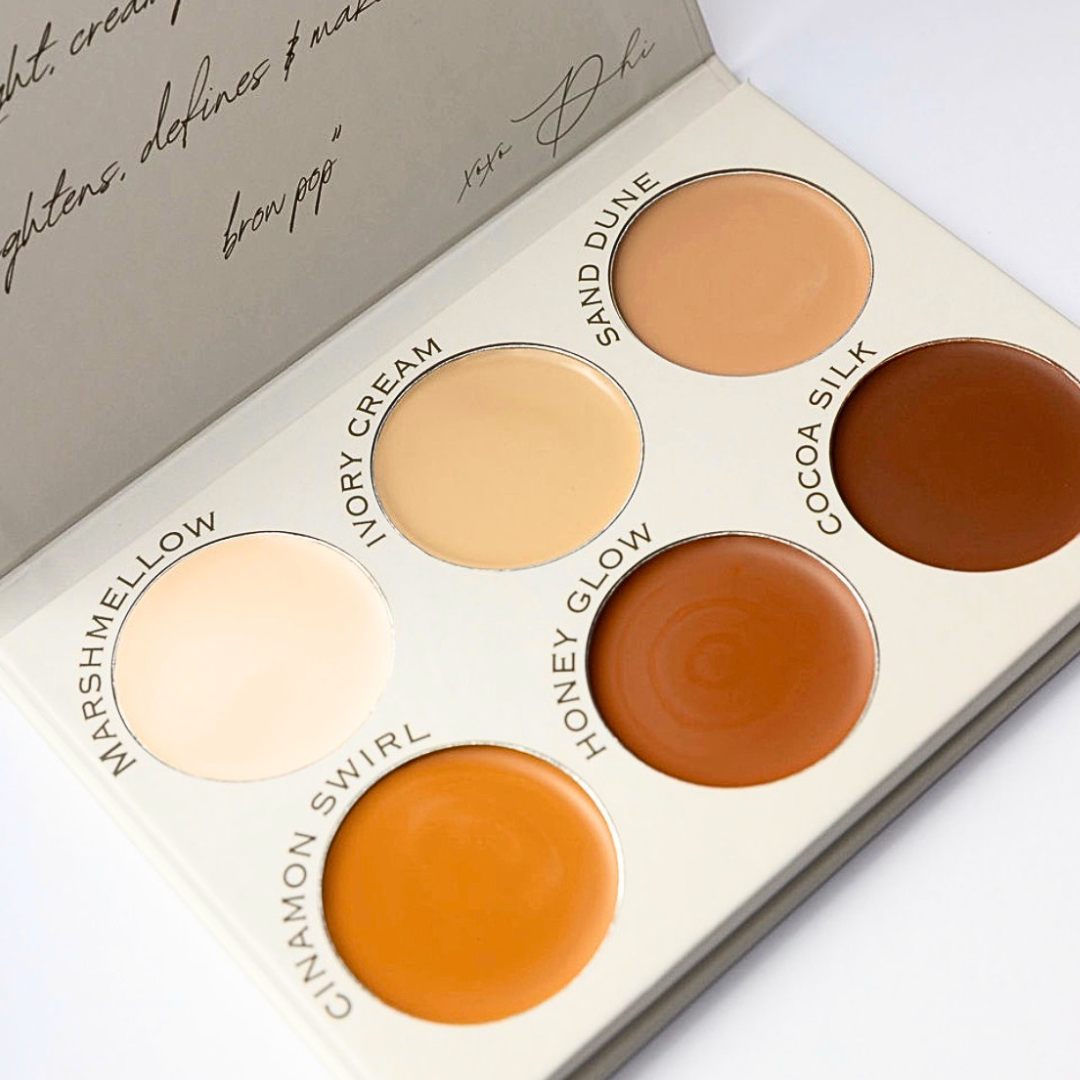 brow palette with six beige and brown shades on a light background