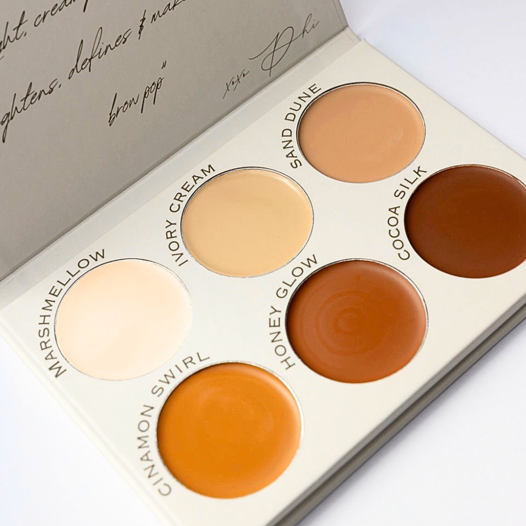 brow palette with six beige and brown shades on a light background